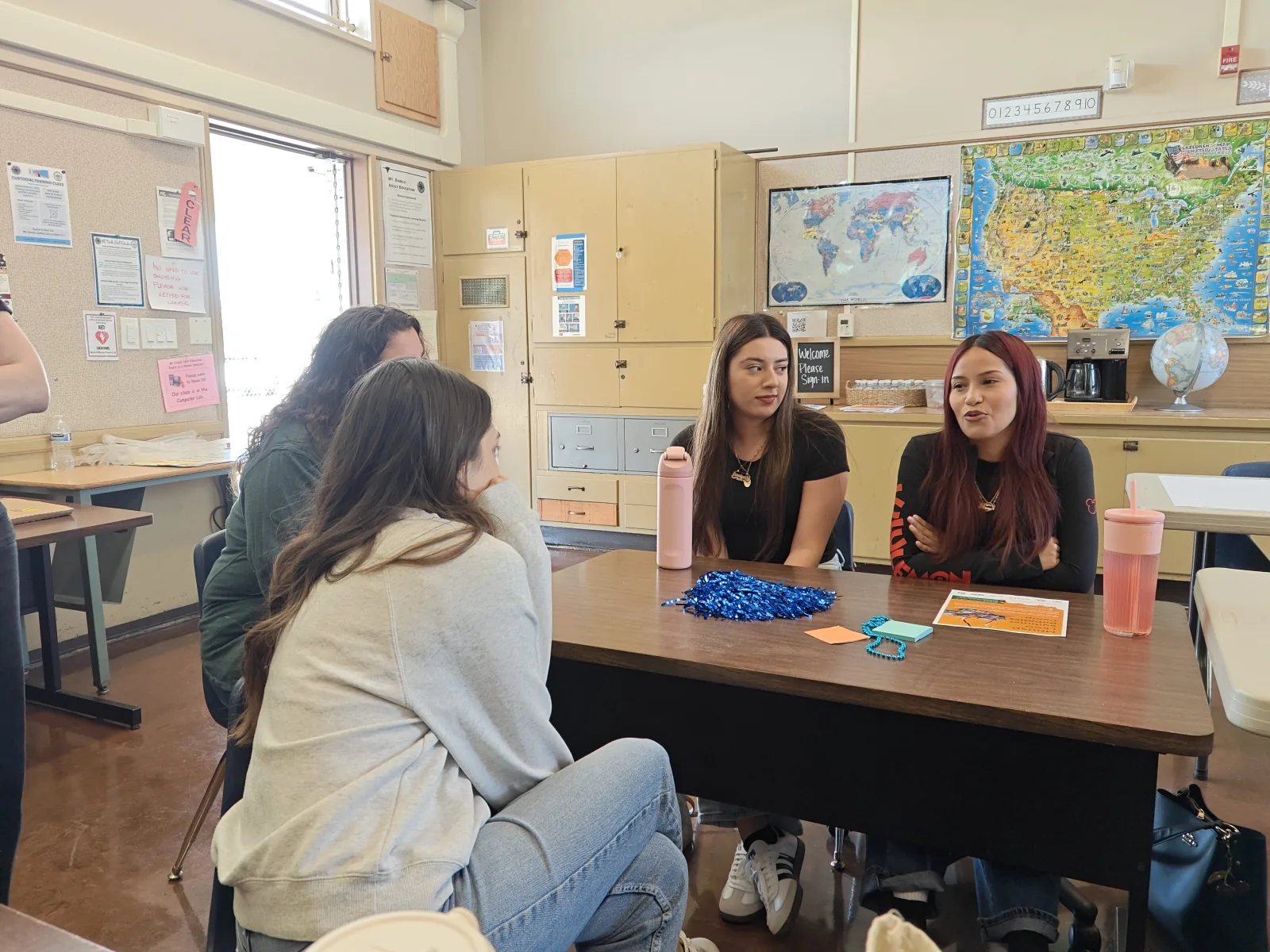 A student leadership presentation on a classroom screen